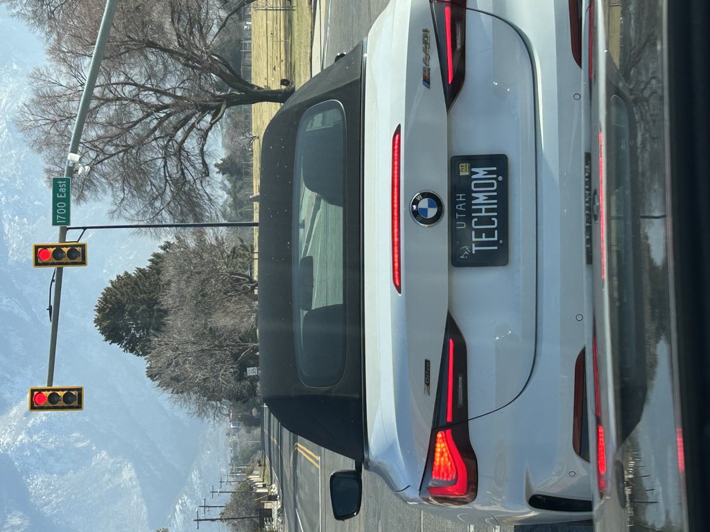 License plate: TECHMOM